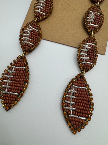 Lily Posh Beaded Football Statement Earrings